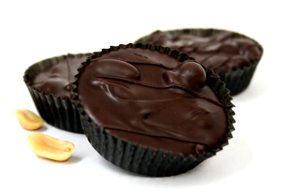 Hand Dipped Dark Chocolate Peanut Cluster. Net Wt. 1.00 lb.