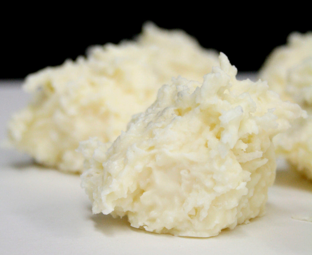 Coconut flakes covered in white chocolate.