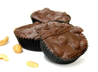 Hand Dipped Milk Chocolate Peanut Cluster. Net Wt. 1.00 lb.